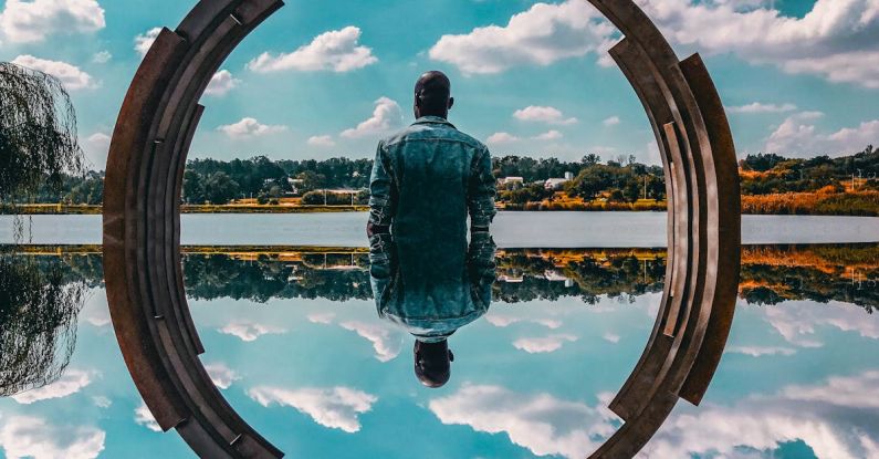 Photoshop - Man Standing Near Body of Water
