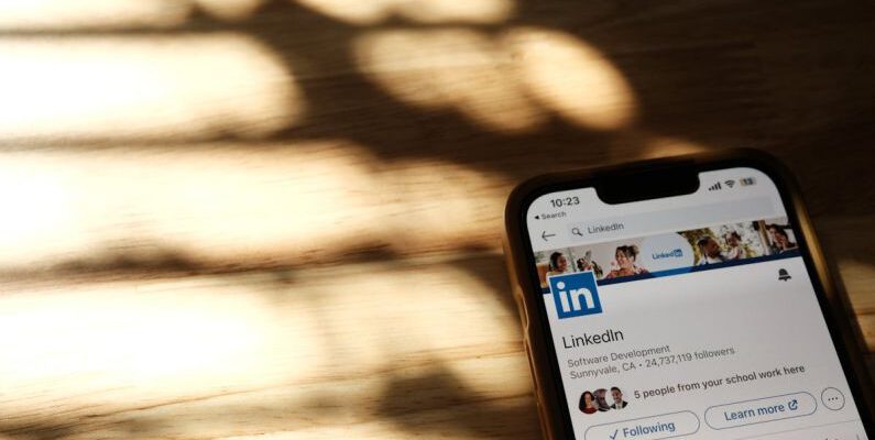 Browser Extensions - Close-up of Linkedin Page on Smartphone Screen