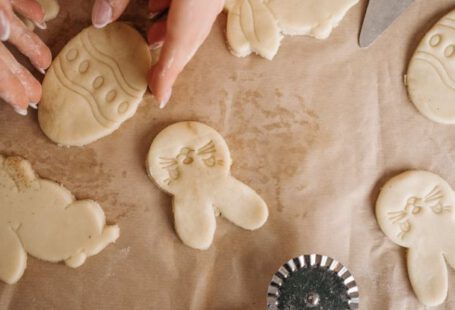 Cookies - Person Holding White Dough on the Wax Paper