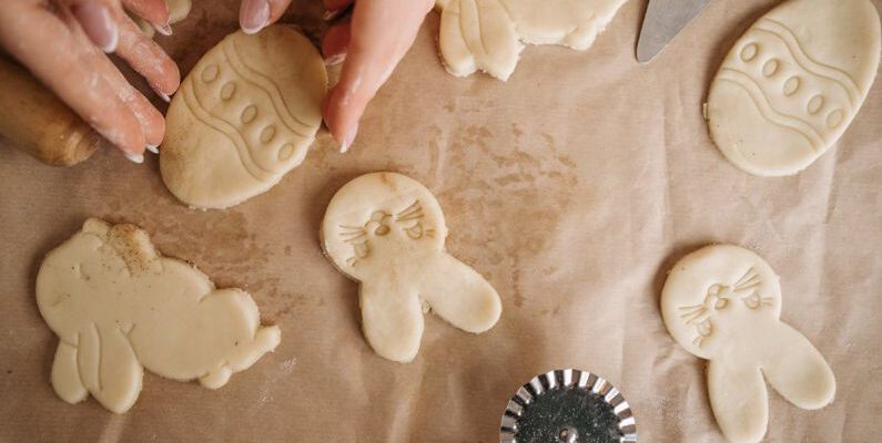 Cookies - Person Holding White Dough on the Wax Paper