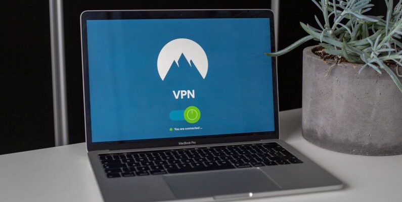 VPN - Grey and Black Macbook Pro Showing Vpn
