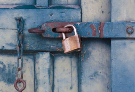 Privacy - Gold Padlock Locking Door